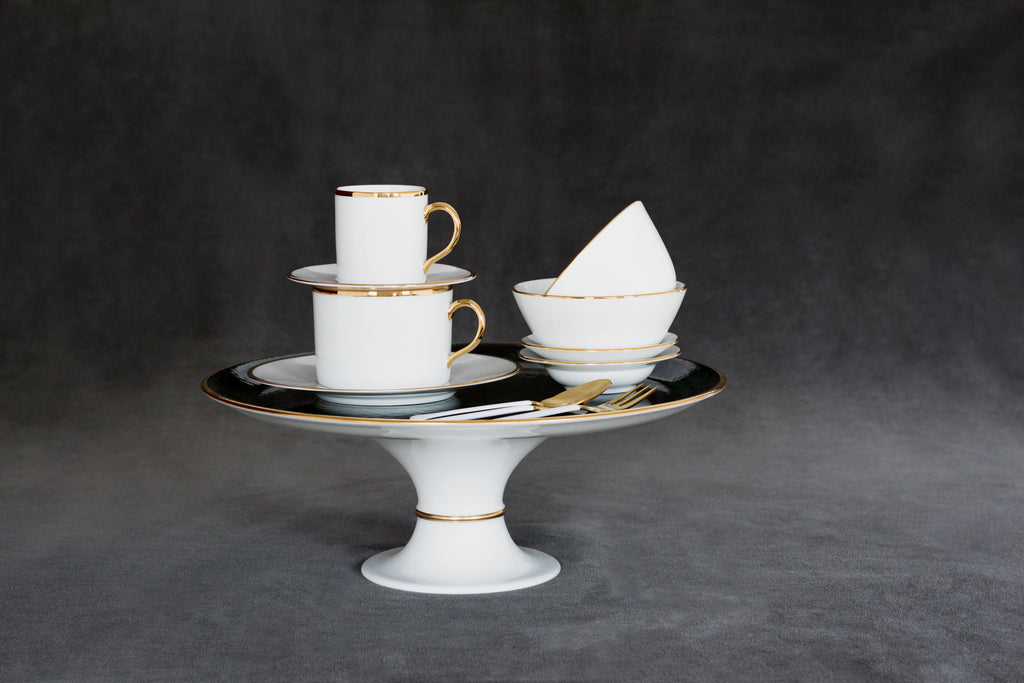  Forest green and gold pedestal cake stand styled with white cups and elegant tableware
