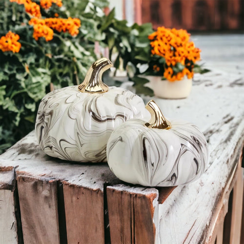 Black and white marble pumpkin decor with gold stems for elegant fall home decor