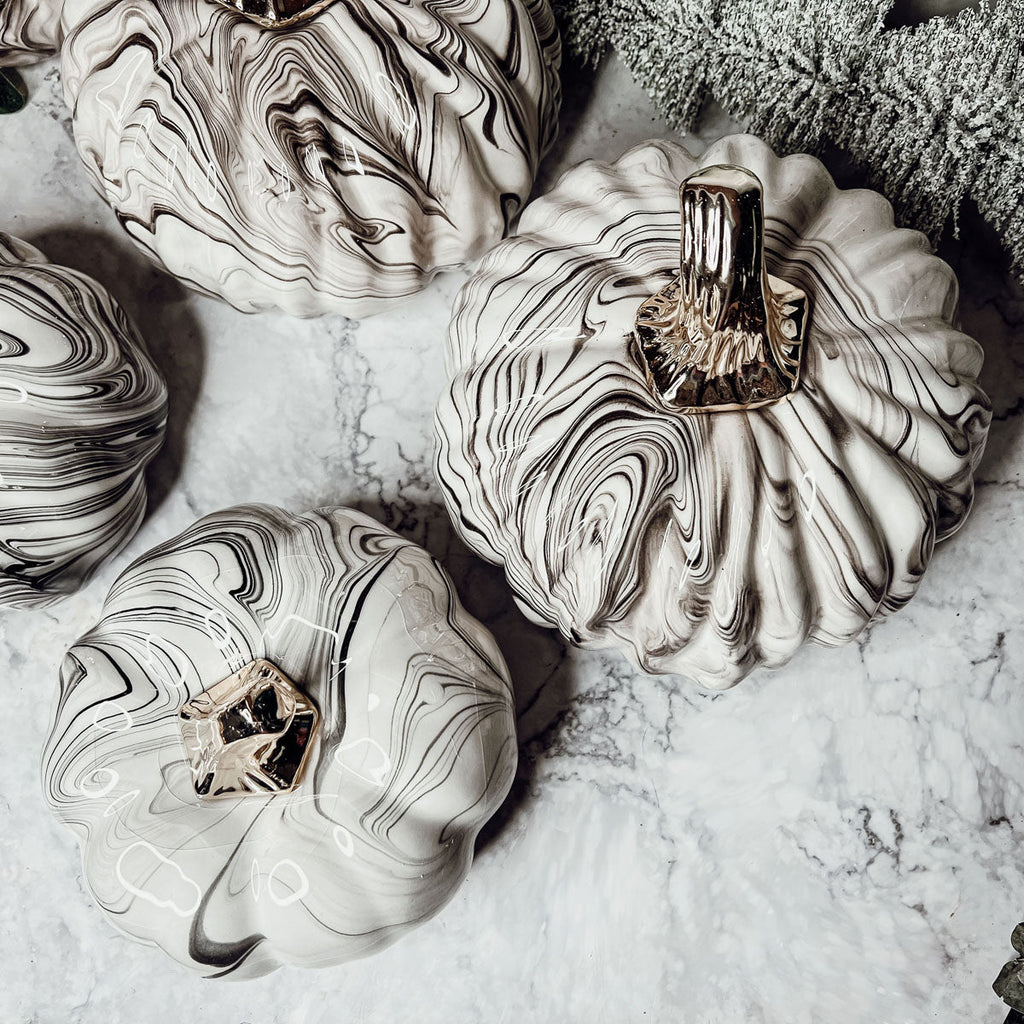 Black and white marble pumpkin decor with silver stems for elegant fall home decor