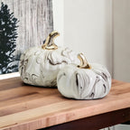 Black and white marble pumpkin decor with gold stems for elegant fall home decor
