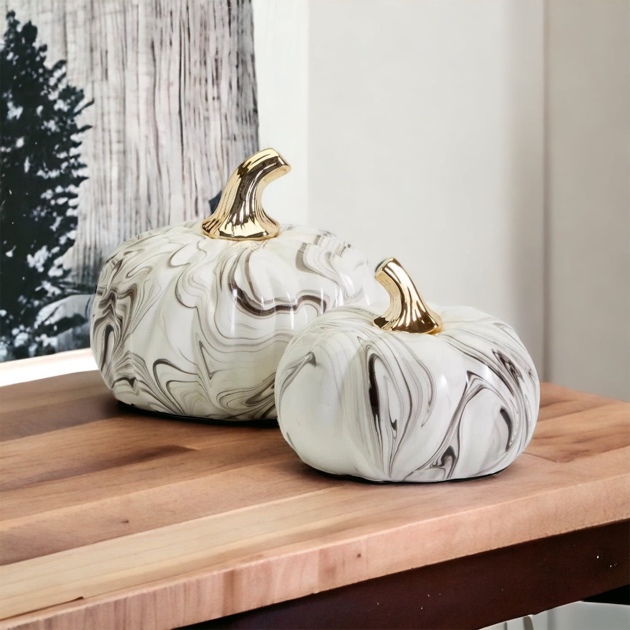 Black and white marble pumpkin decor with gold stems for elegant fall home decor