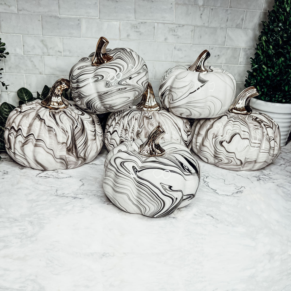 Black and white marble pumpkin decor with silver stems for elegant fall home decor
