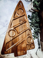 Wooden Christmas tree cheese and charcuterie board for festive gatherings